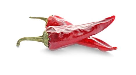 Photo of Dry chili peppers on white background