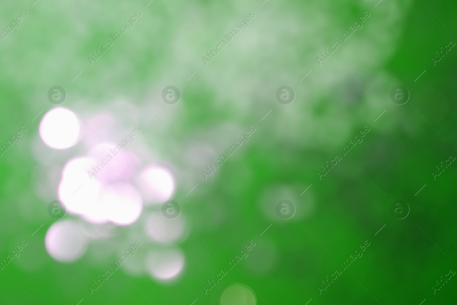 Image of St. Patrick day. Green background with blurred lights, bokeh effect