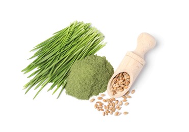 Wheat grass powder, scoop with seeds and fresh sprouts isolated on white, top view