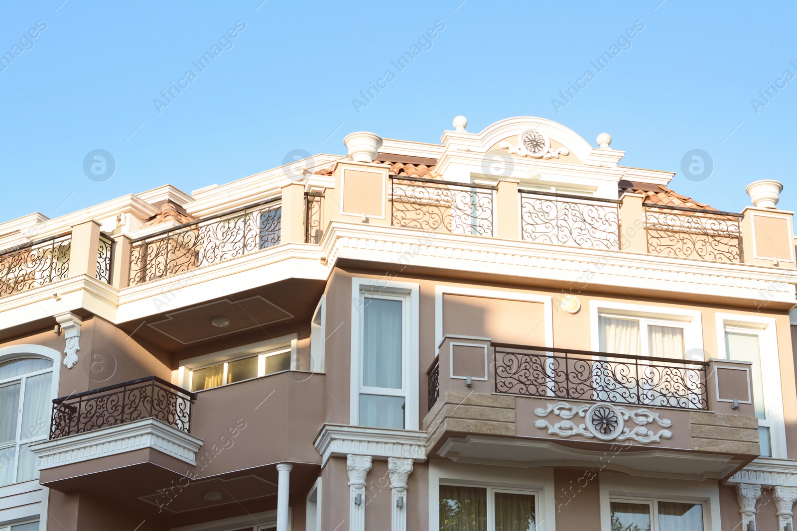 Photo of Exterior of beautiful residential building with balconies