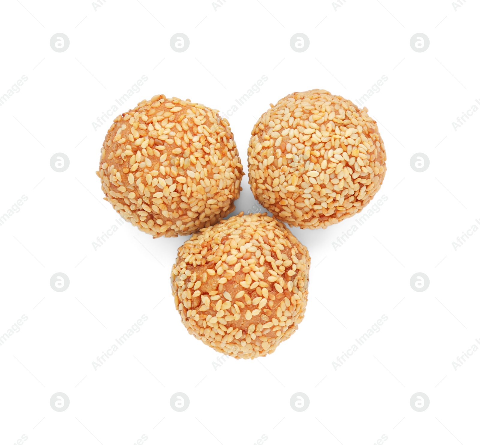 Photo of Delicious sesame balls on white background, top view