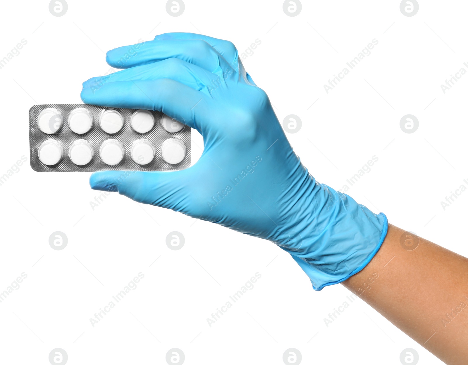 Photo of Scientist in protective gloves holding pills on white background, closeup