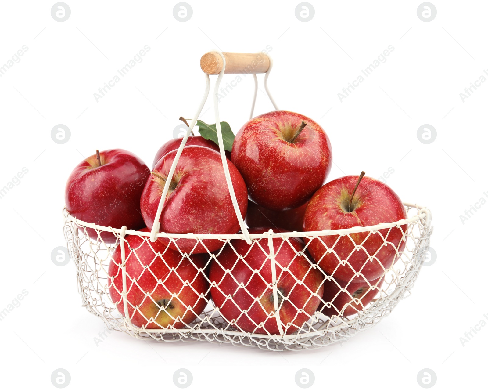 Photo of Metal basket of ripe juicy red apples with leaf on white background