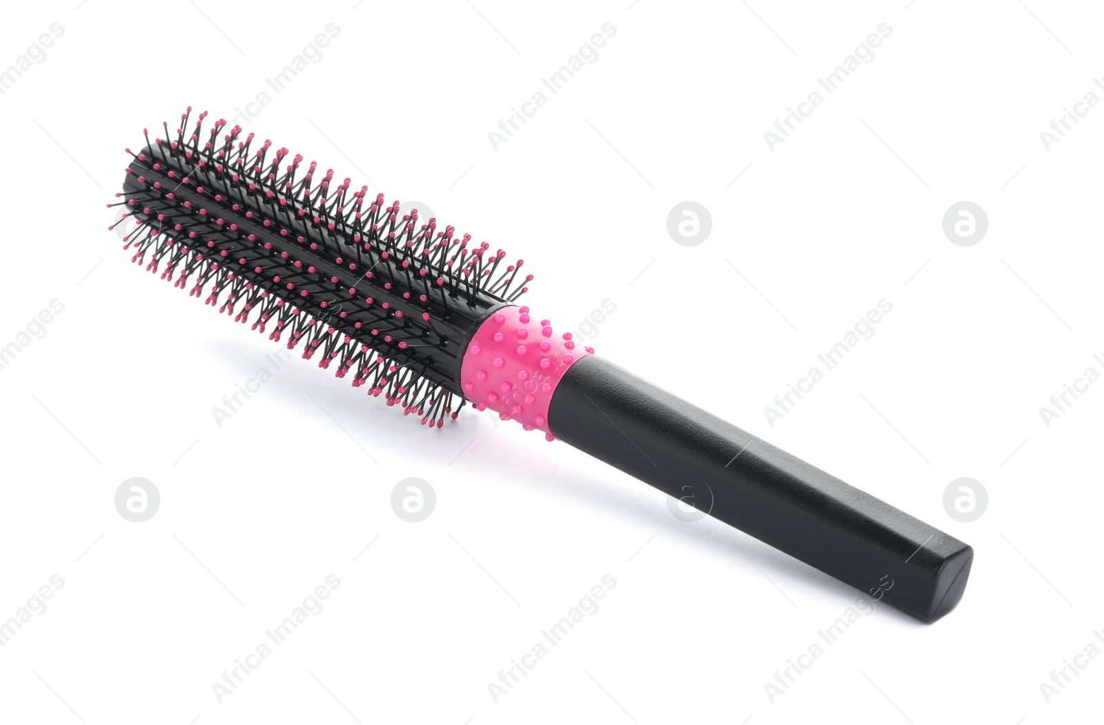 Photo of New round hair brush isolated on white