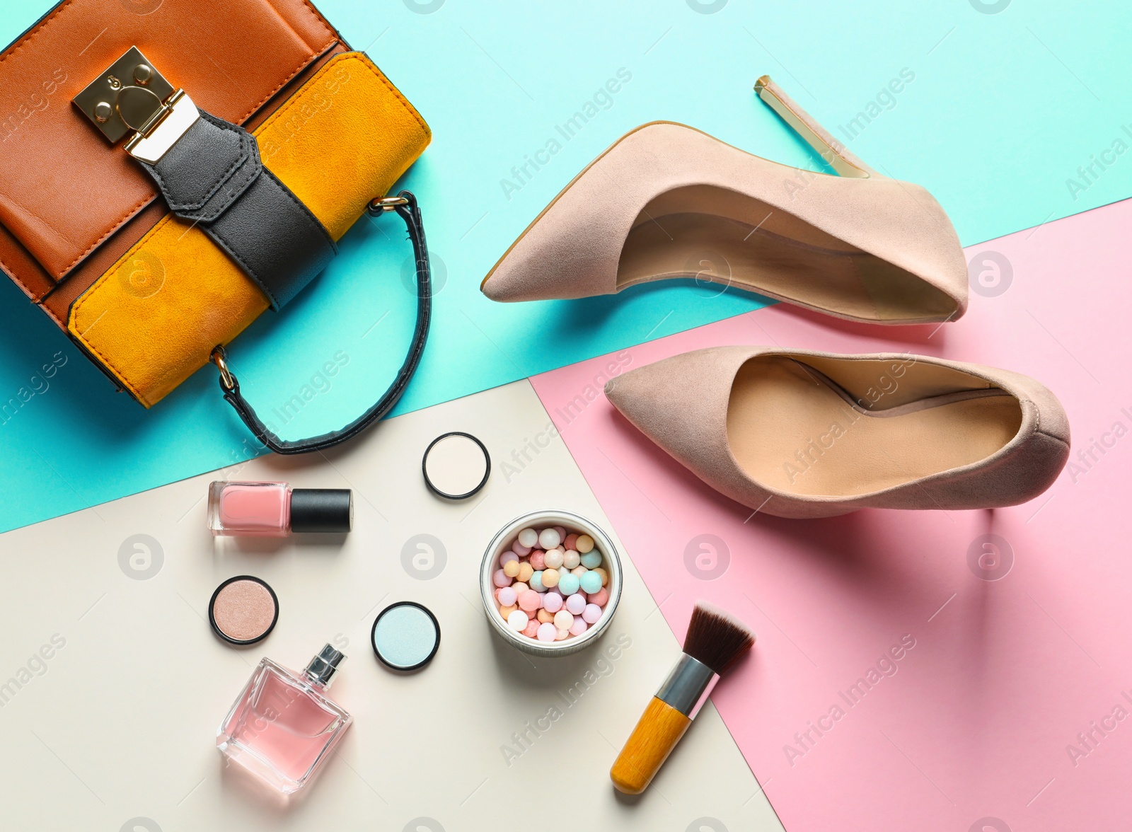 Photo of Flat lay composition with decorative cosmetics on color background