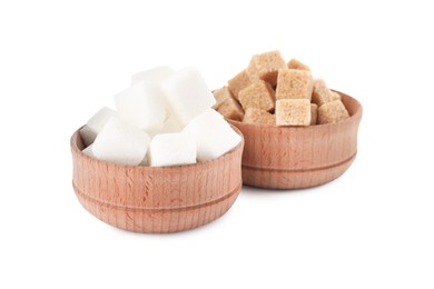 Bowls with different refined sugar cubes on white background
