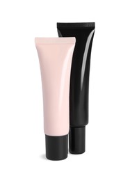 Photo of Tubes of skin foundation on white background. Makeup product