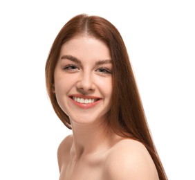 Portrait of smiling woman with freckles on white background