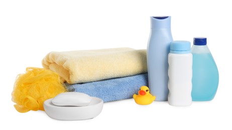 Baby cosmetic products, bath duck, sponge and towels isolated on white