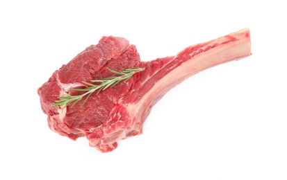 Photo of Raw ribeye steak and rosemary isolated on white, top view