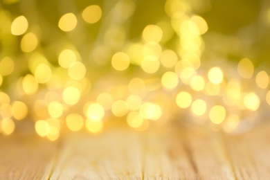 Photo of Beautiful abstract background with blurred yellow Christmas lights