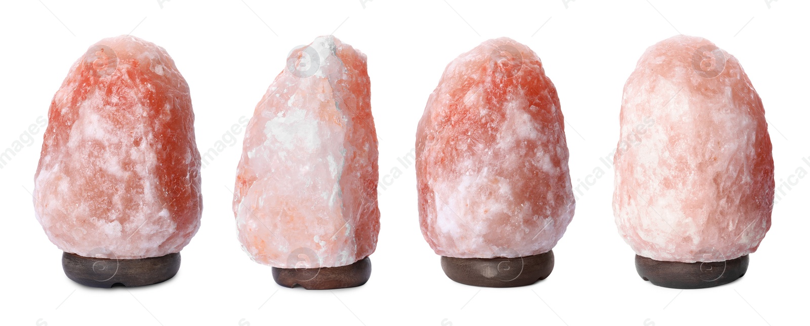 Image of Set with pink Himalayan salt lamps on white background. Banner design 