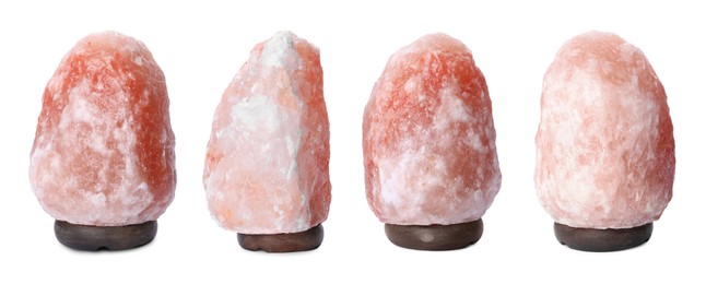Set with pink Himalayan salt lamps on white background. Banner design 