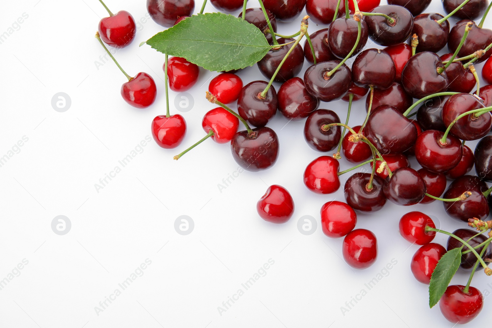 Photo of Sweet red cherries on white background