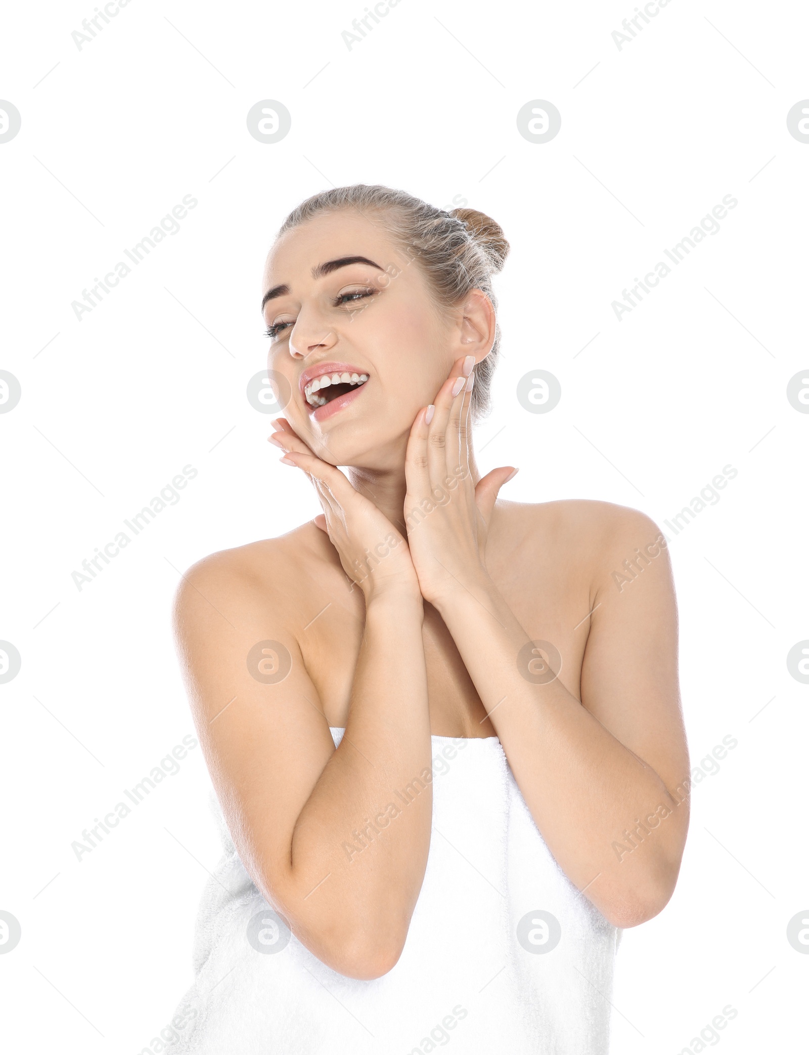 Photo of Portrait of young pretty woman with towel on white background