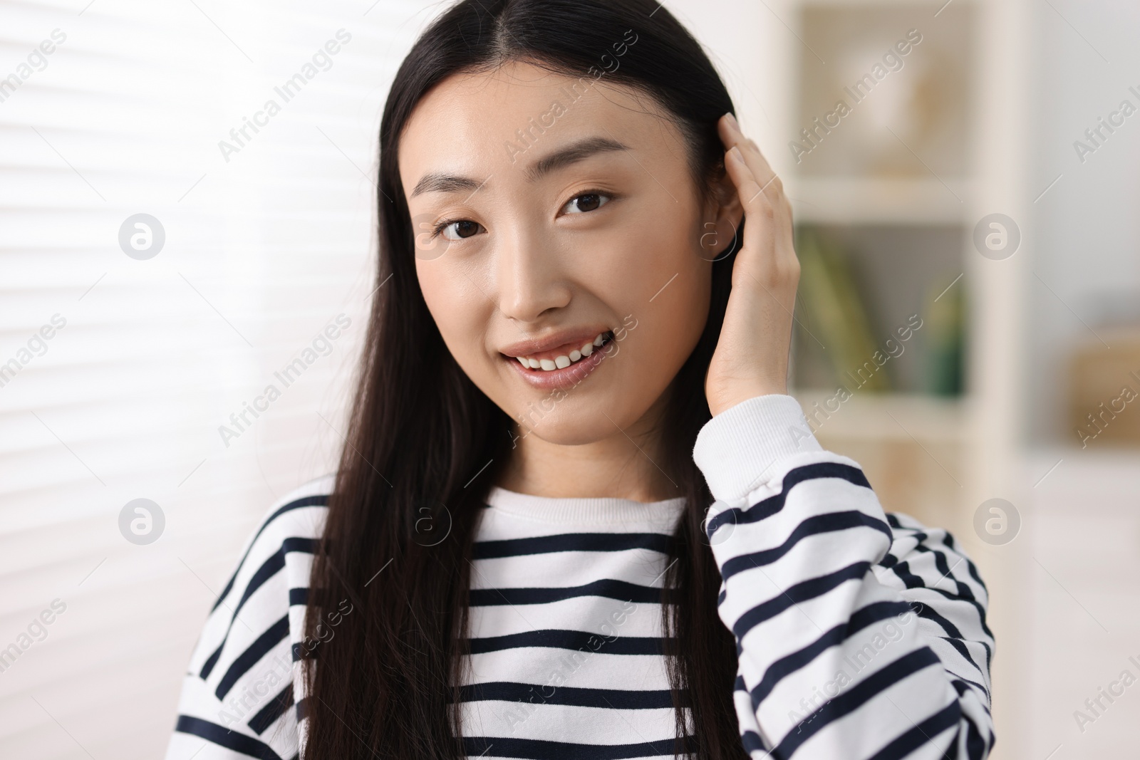 Photo of Portrait of smiling confident businesswoman in office