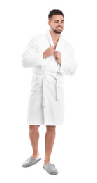 Photo of Handsome man wearing bathrobe on white background