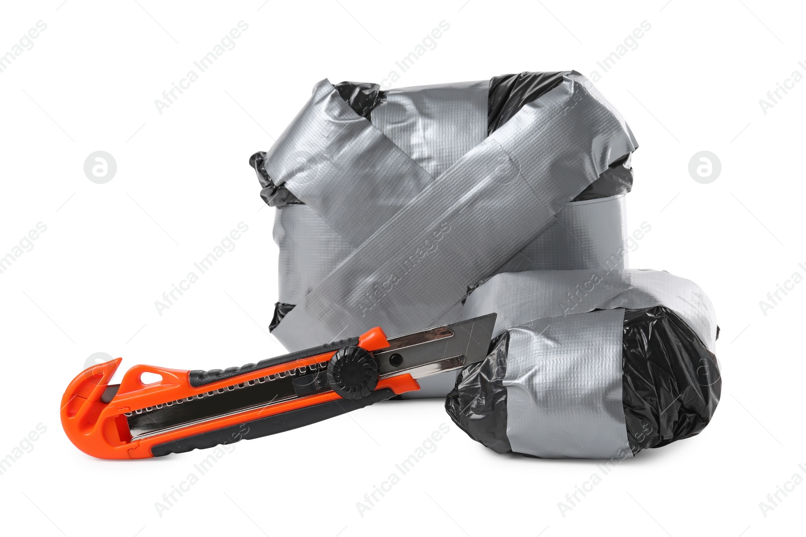 Photo of Packages with narcotics and stationery knife isolated on white