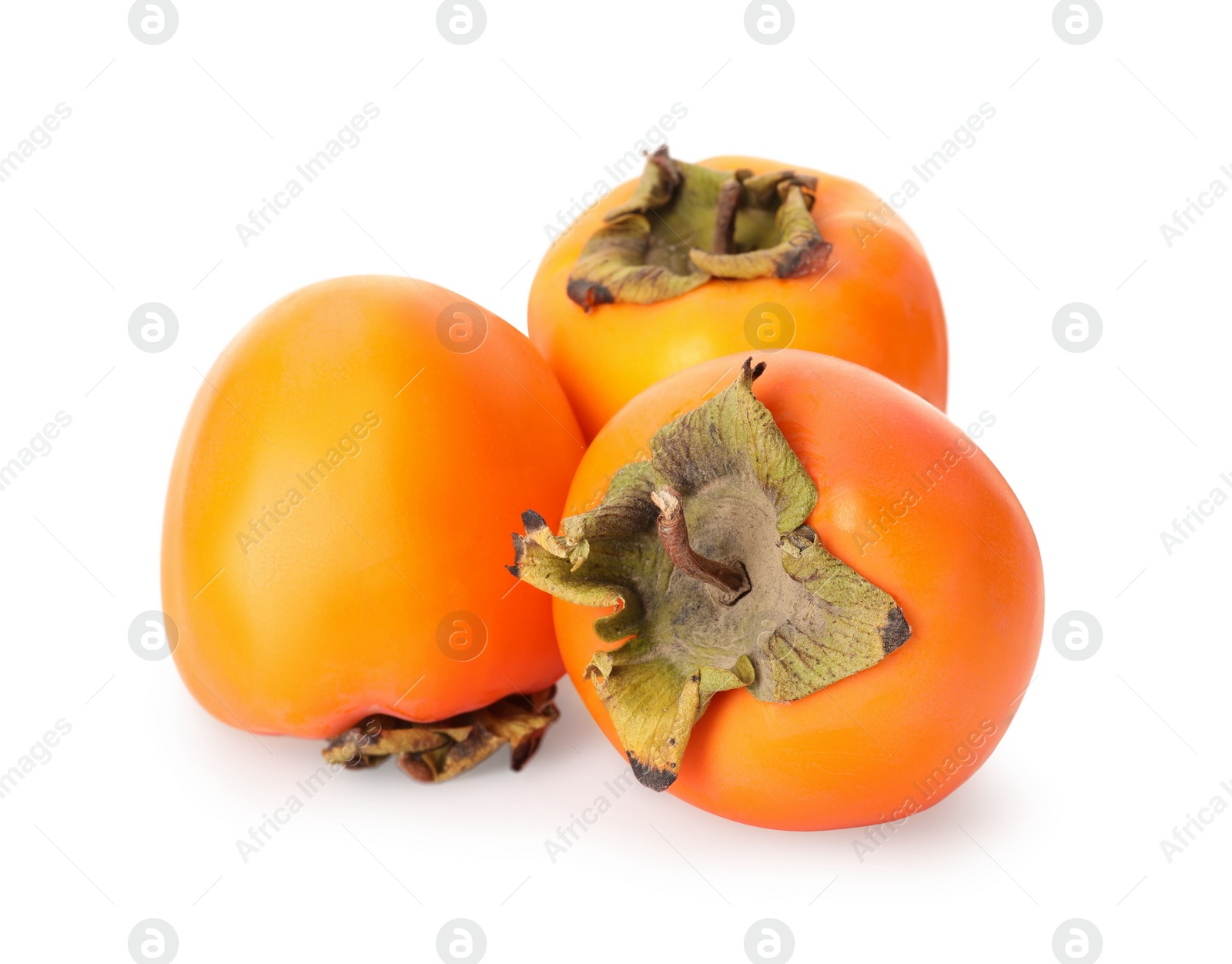 Photo of Delicious ripe juicy persimmons on white background