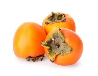 Photo of Delicious ripe juicy persimmons on white background