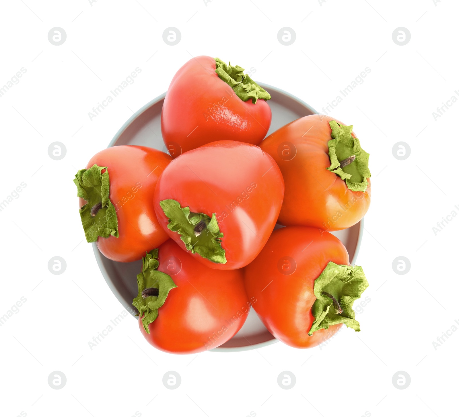 Photo of Plate with delicious fresh persimmons isolated on white, top view