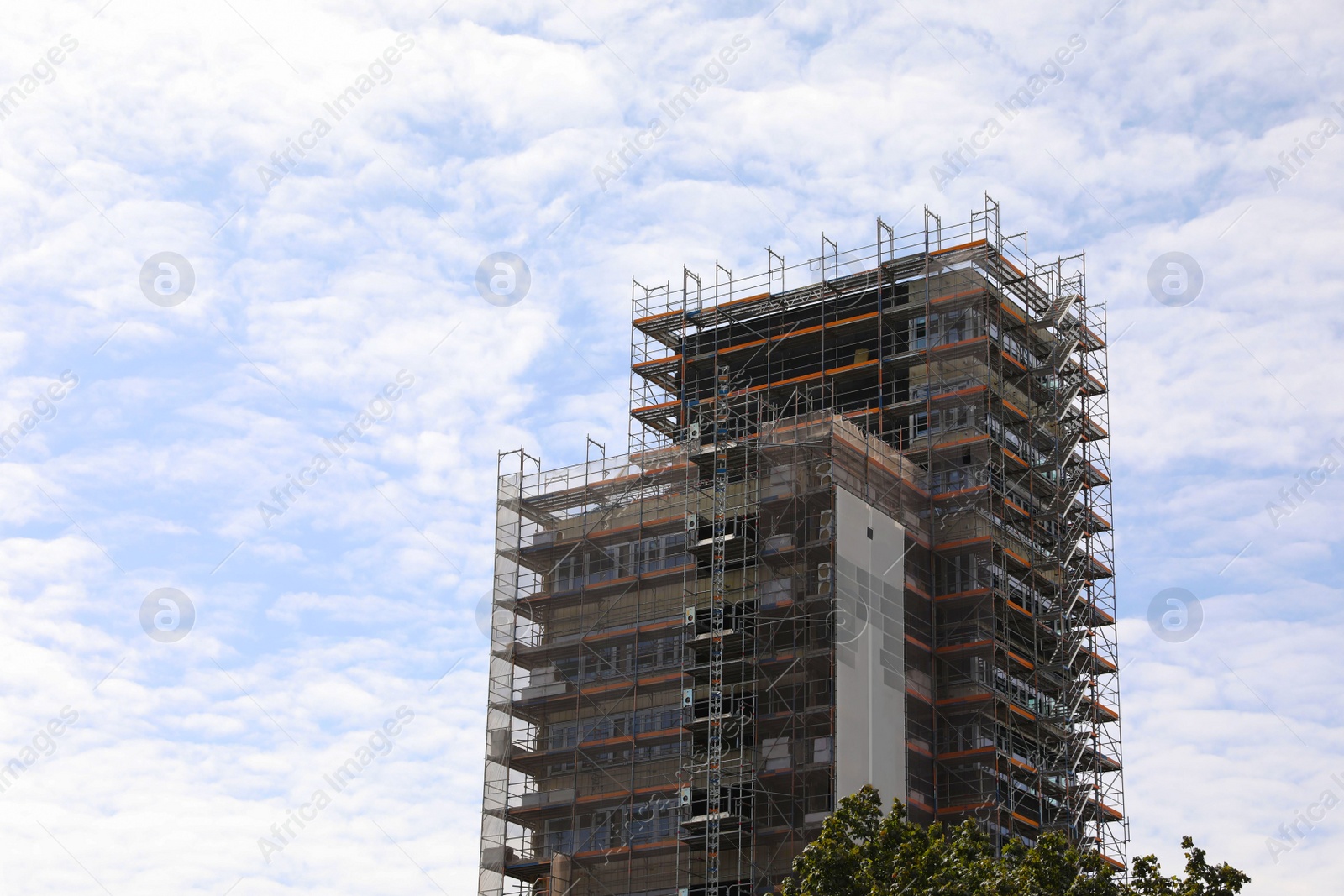 Photo of View of construction site with unfinished building against sky