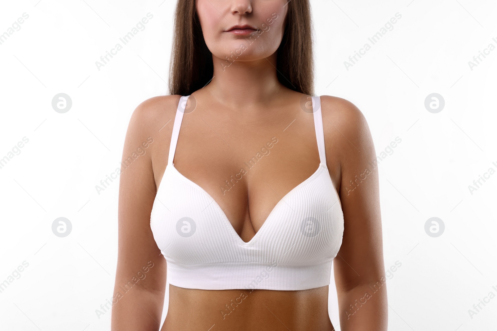 Photo of Woman with beautiful breast on white background, closeup