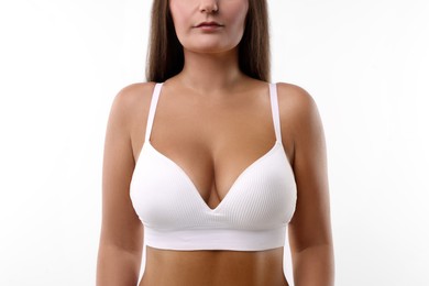 Photo of Woman with beautiful breast on white background, closeup