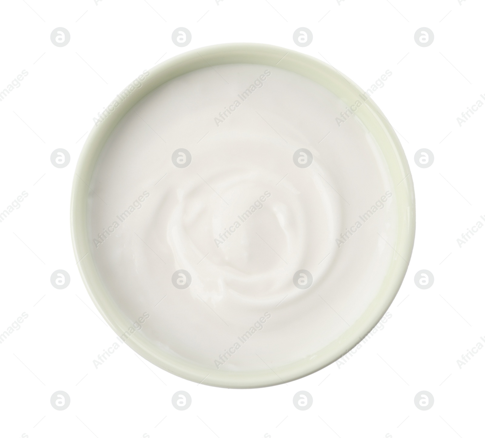 Photo of Bowl with delicious organic yogurt isolated on white, top view