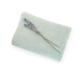 Soft towel and lavender isolated on white, top view