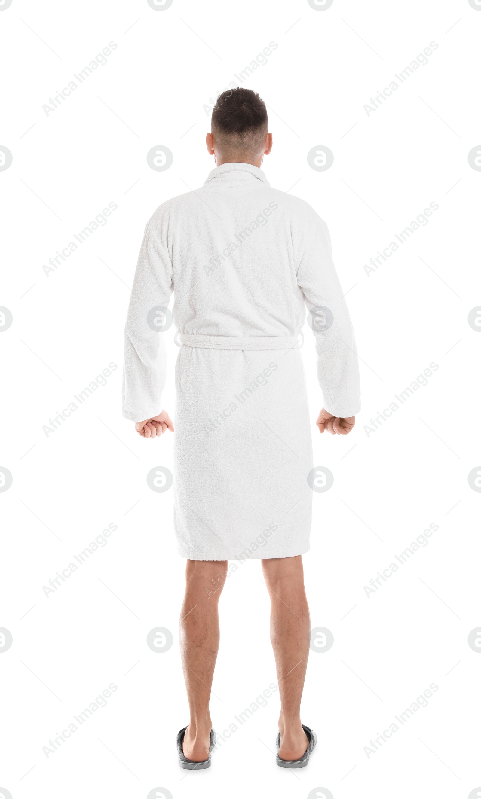 Photo of Man wearing bathrobe on white background, back view