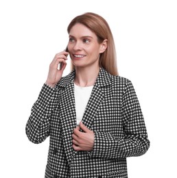 Beautiful happy businesswoman talking on smartphone against white background