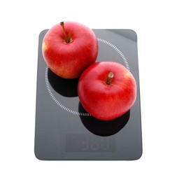 Modern kitchen scale with fresh red apples isolated on white
