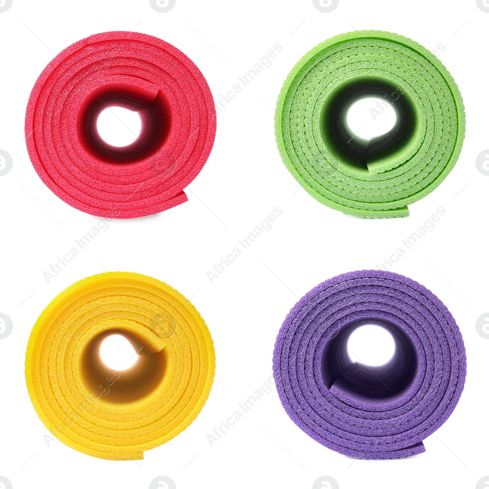 Image of Set with colorful rolled camping mats on white background 