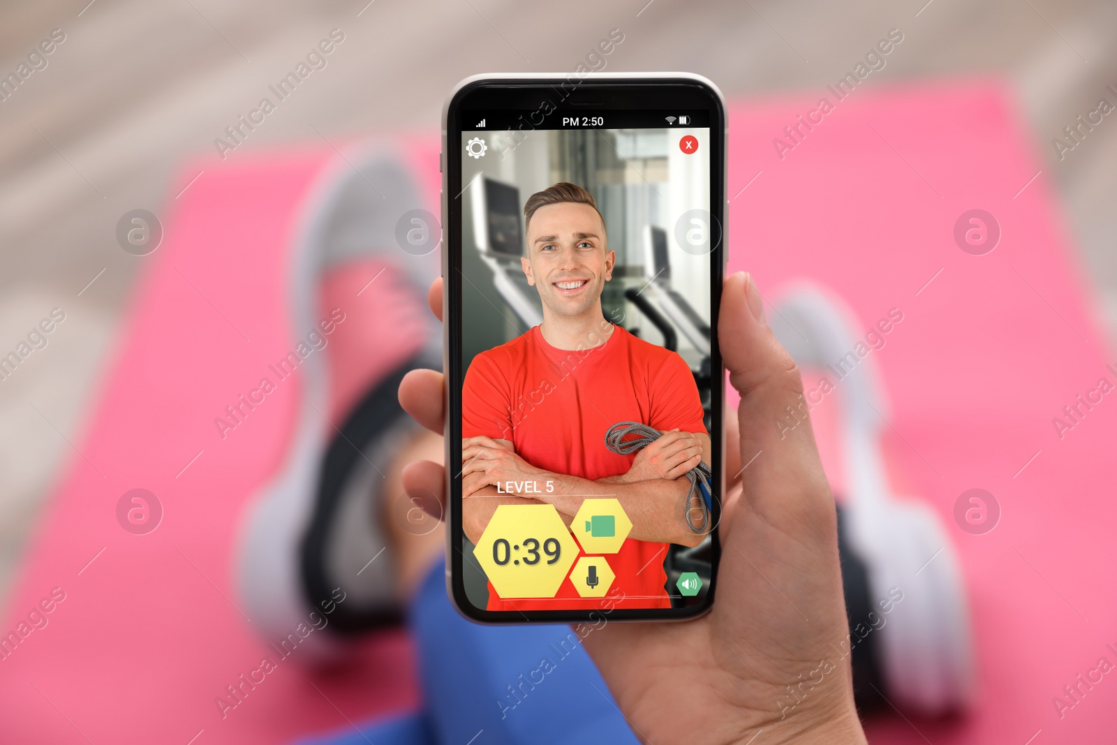 Image of Woman having workout with personal trainer via smartphone at home, closeup