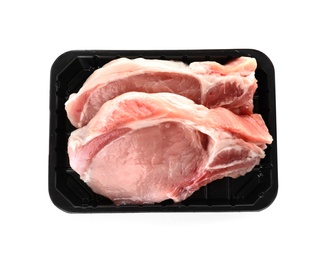 Photo of Plastic container with raw steaks on white background, top view. Fresh meat