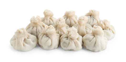 Many tasty khinkali (dumplings) isolated on white. Georgian cuisine