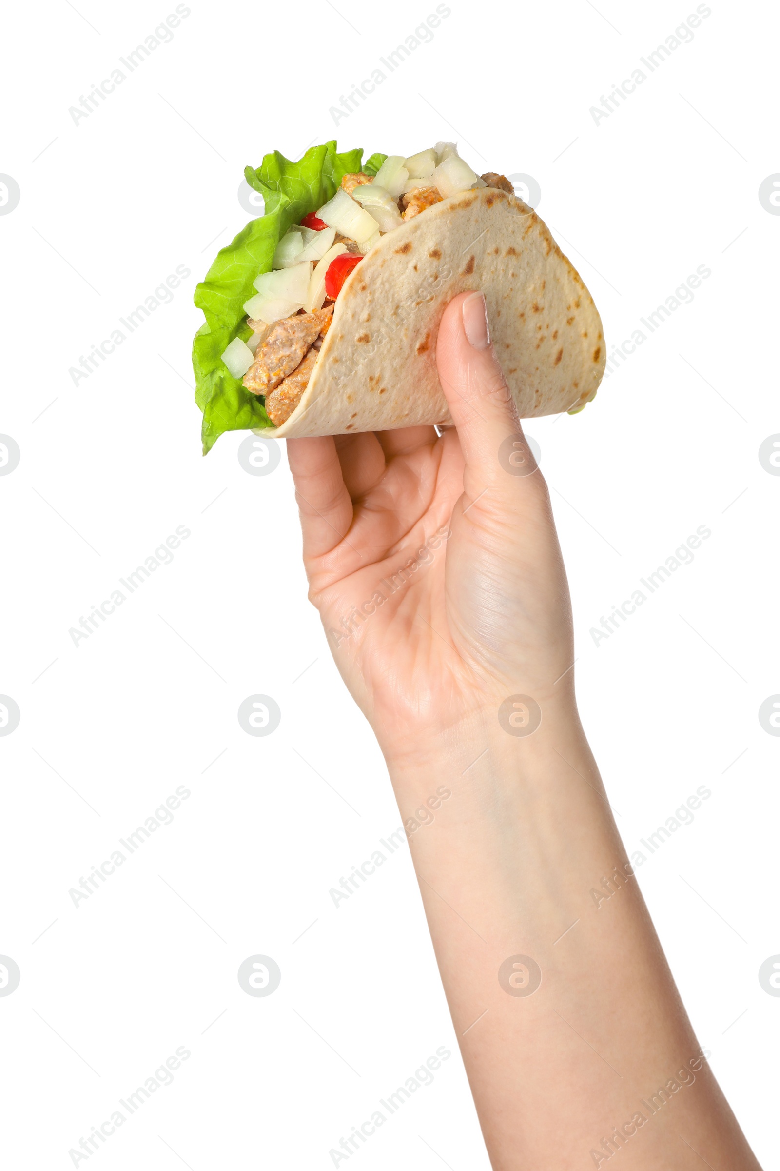 Photo of Woman holding delicious taco with meat and vegetables on white background, closeup