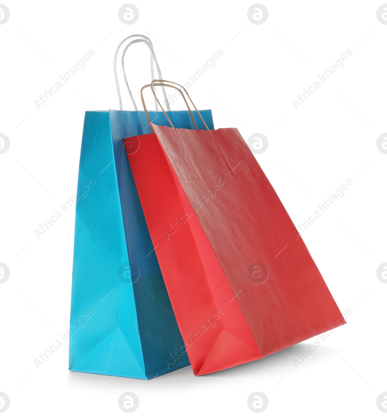 Photo of Mockup of paper shopping bags on white background