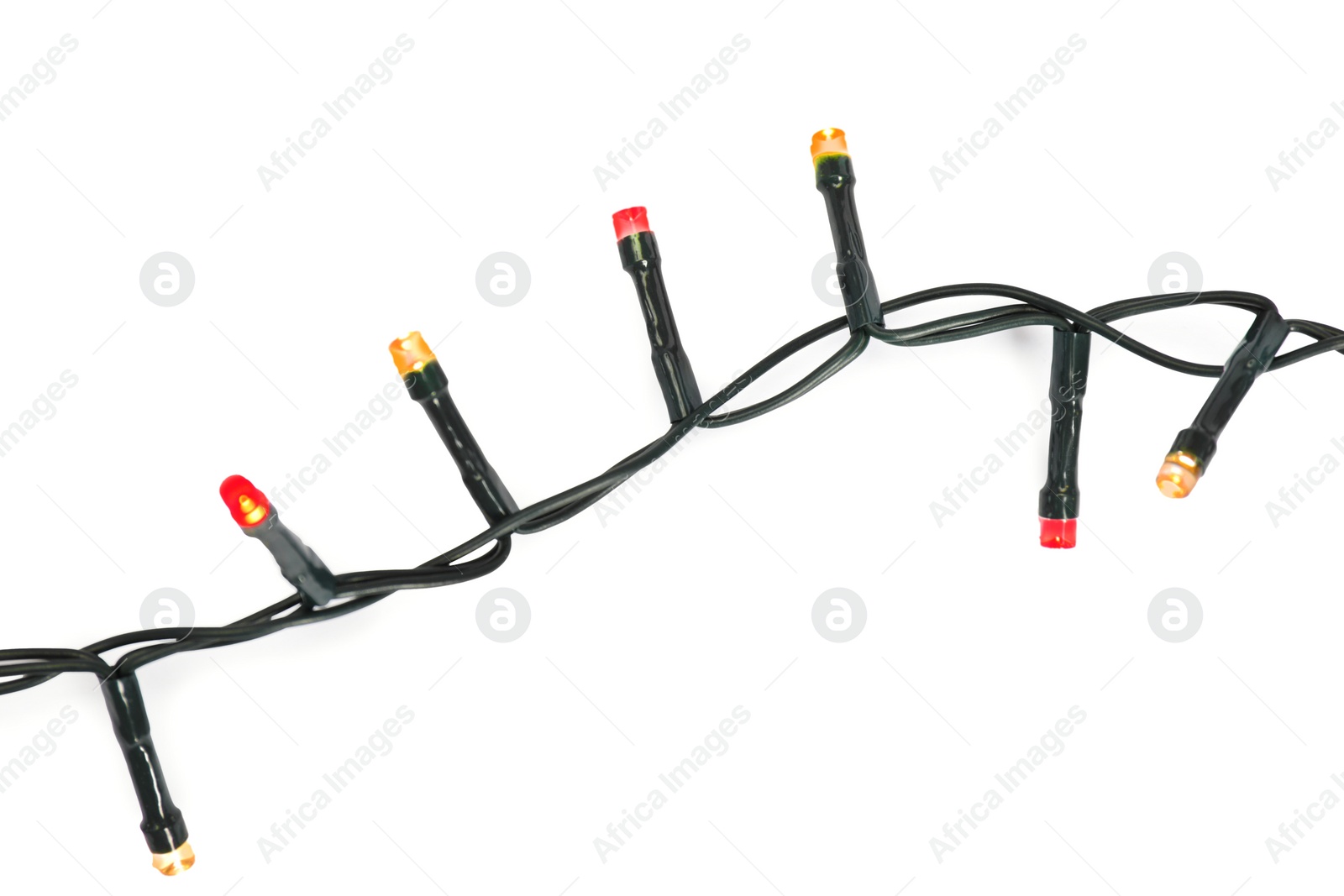 Photo of Beautiful Christmas lights on white background, top view