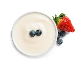 Photo of Bowl with tasty yogurt and berries on white background, top view