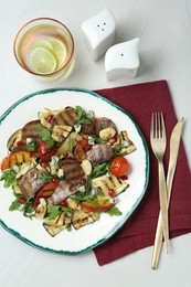 Photo of Delicious salad with beef tongue, grilled vegetables, peach and blue cheese on white table, flat lay