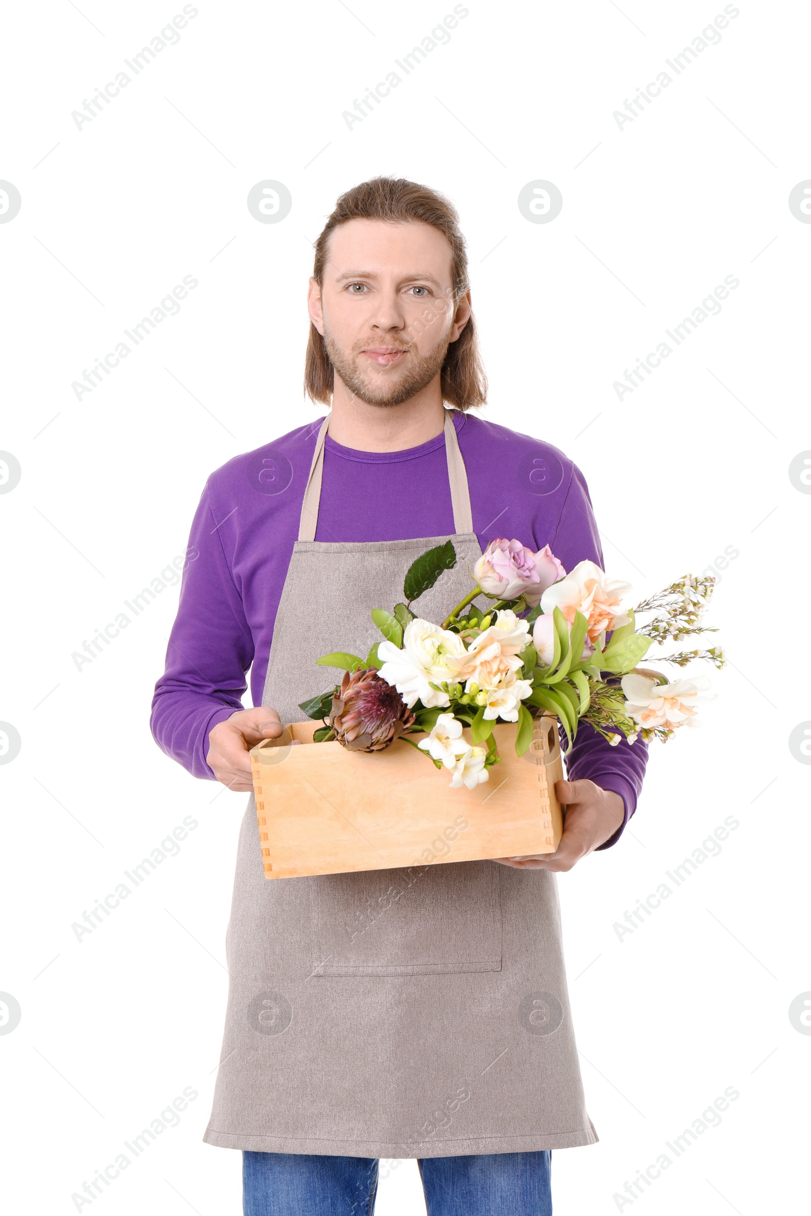 Photo of Male florist holding basket with flowers on white background