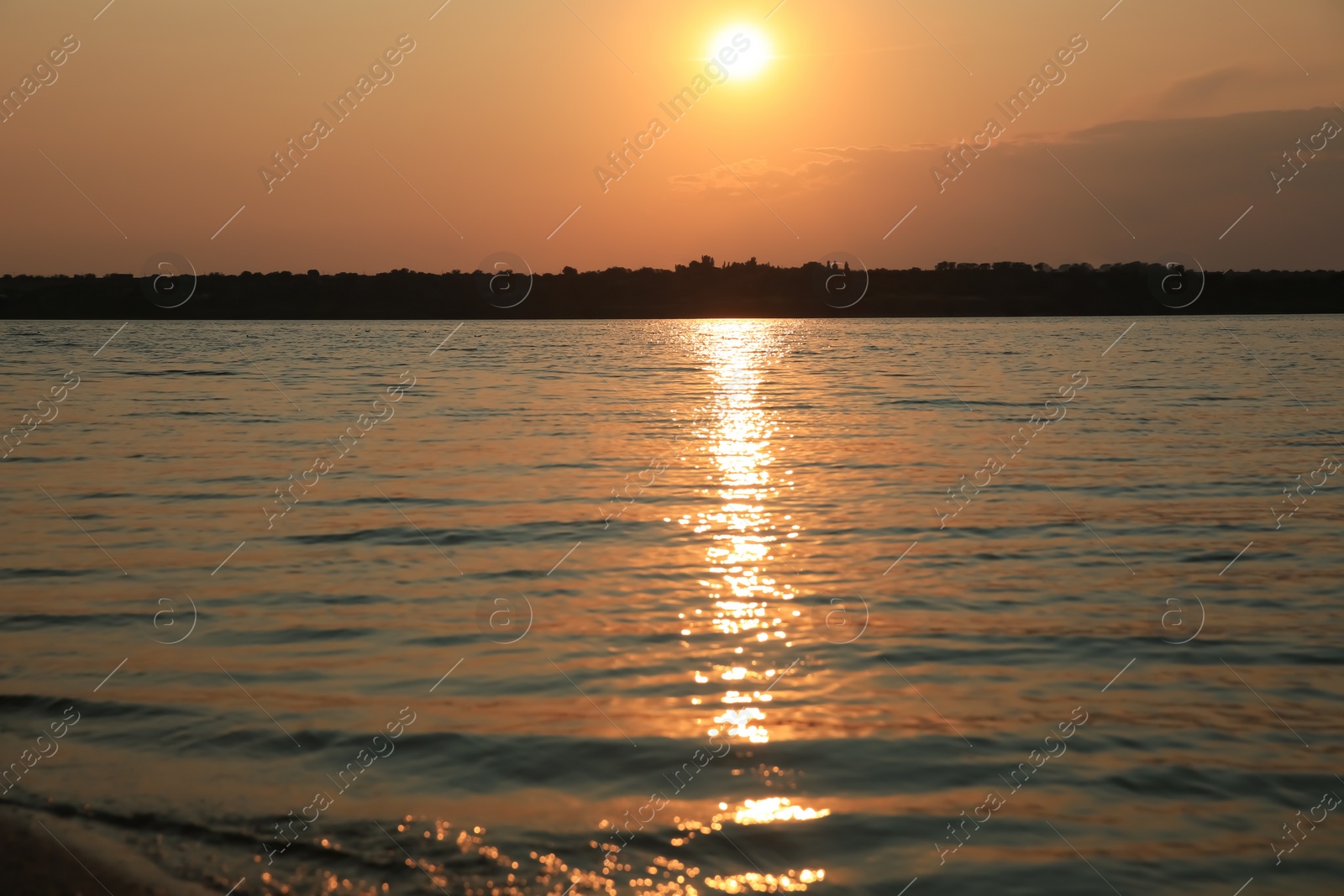 Photo of Landscape with beautiful sunset over calm river