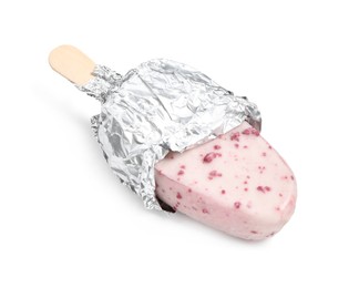 Photo of Ice cream bar with glaze wrapped in foil on white background