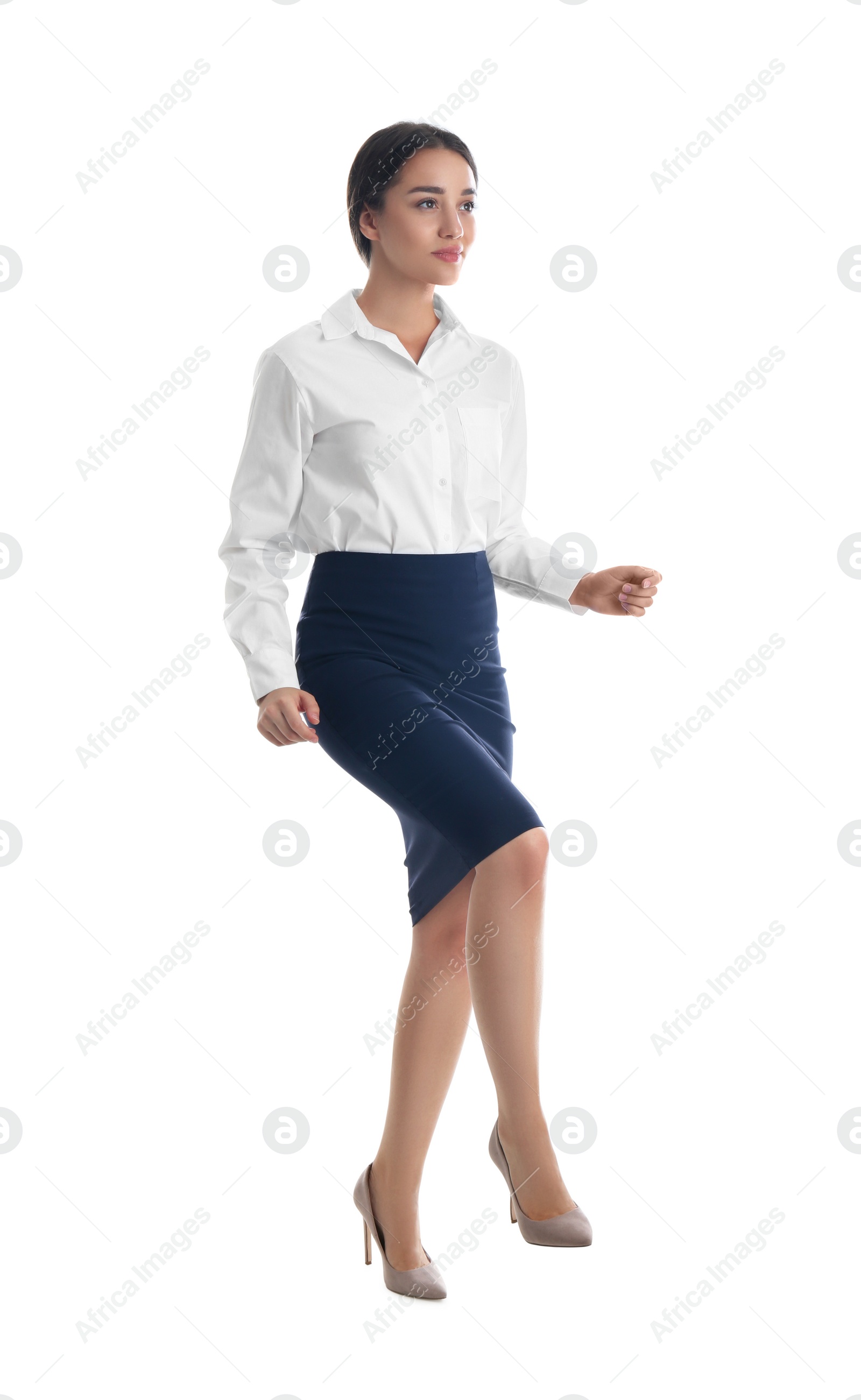 Photo of Businesswoman imitating stepping up on stairs against white background. Career ladder concept