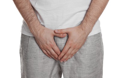 Photo of Man suffering from herpes genital on white background, closeup