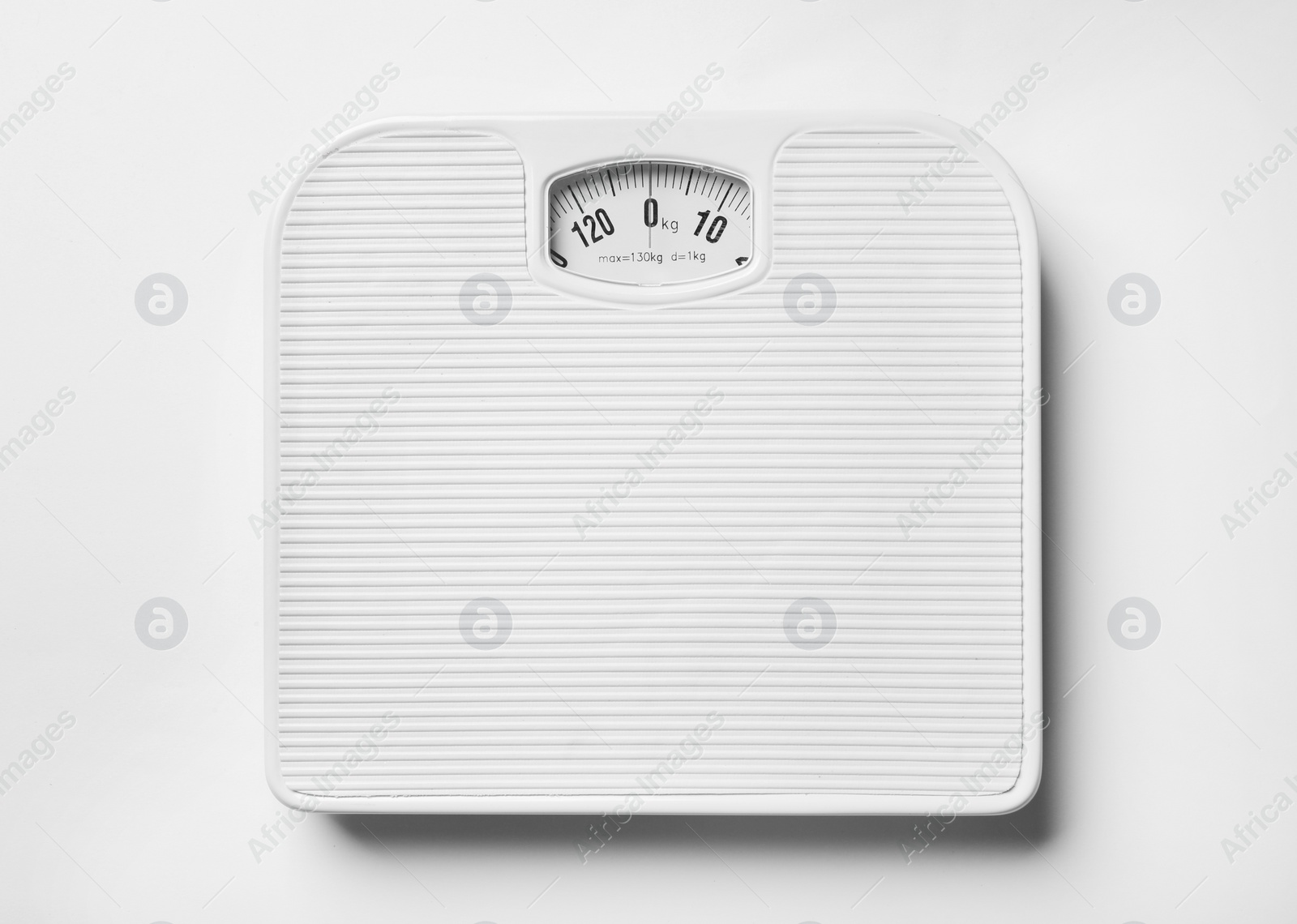 Photo of Bathroom scales on white background, top view. Weight loss concept