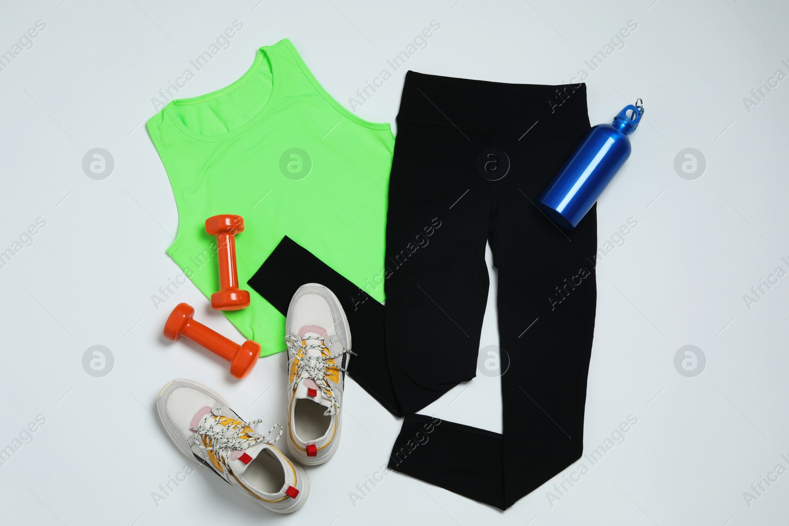 Photo of Composition with sportswear on white background, top view