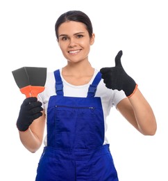 Photo of Professional worker with putty knives on white background